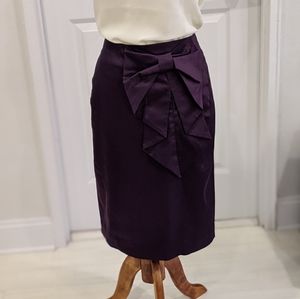 Dark purple pencil skirt with bow detail